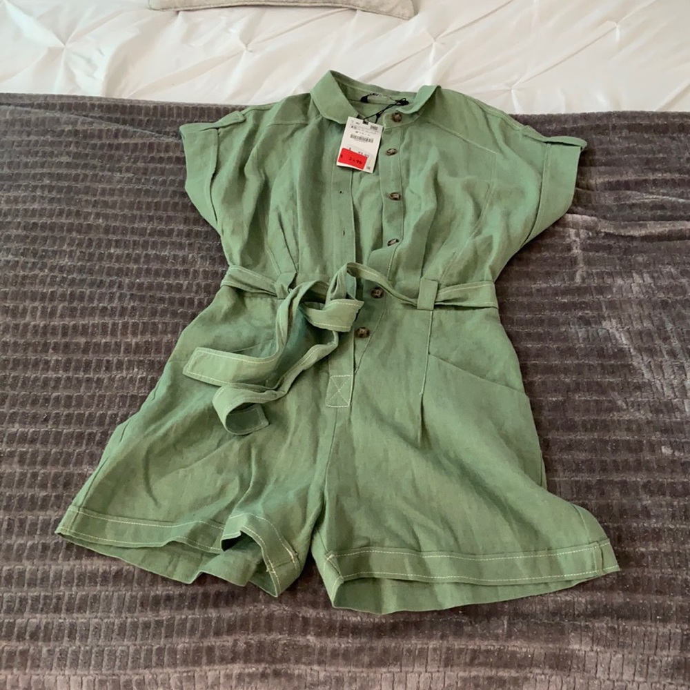 Super cute green romper! NEW WITH TAGS